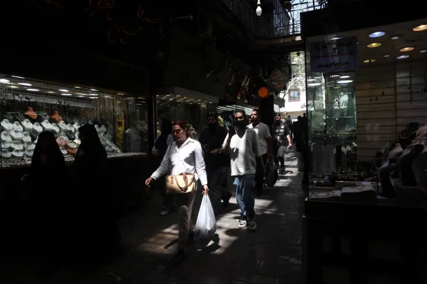 People walk in the Grand Bazaar in Tehran, Iran, August 11, 2026. Majid Asgaripour/WANA (West Asia News Agency) via Reuters