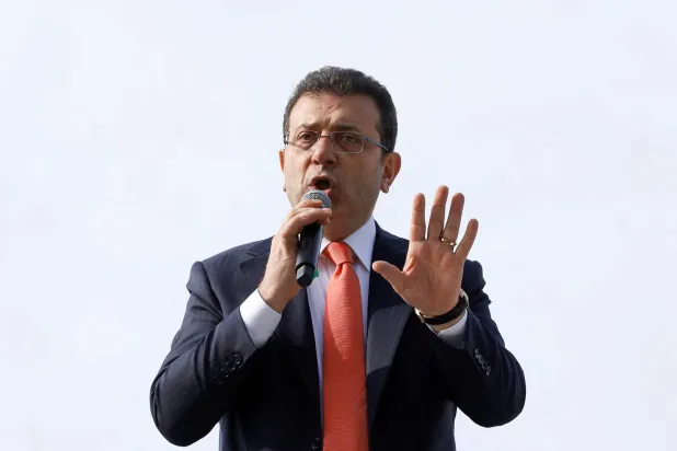 Istanbul Mayor Ekrem Imamoglu, from the main opposition Republican People's Party (CHP), addresses his supporters from the top of a bus after giving testimony to judicial authorities at the Justice Palace, known as Caglayan Courthouse, in Istanbul, Türkiye, January 31, 2025. (Reuters) 