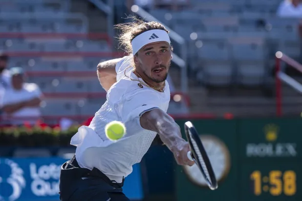 05 August 2026, Canada, Montreal: German tennis player Alexander Zverev plays a backhand return against Netherlands' Tallon Griekspoor during their men's singles second round tennis match at the National Bank Open tennis tournament in Montreal. (dpa)