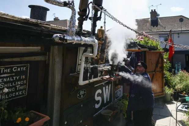 London steam ship enthusiast Peter McLaughlin began recreating a boat's boiler room in his back garden shed after retiring early with ill health. Henry NICHOLLS / AFP
