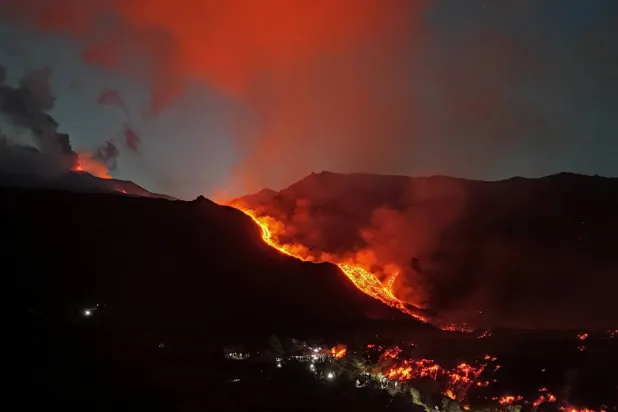  A drone view of volcanic ash and lava during an eruption at Mount Etna, forcing authorities to suspend flights at Catania airport, in Sicily, Italy, August 12, 2026. (Reuters)