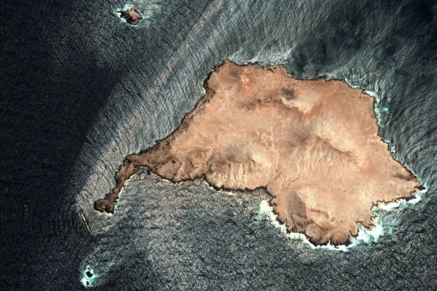A satellite image shows the damaged vessel Caroline Bezengi and an oil slick off the Hallaniyat Islands, off the coast of Dhofar Governorate, Oman, August 5, 2026. Pléiades. CNES 2026, Distribution Airbus DS/Handout via REUTERS  