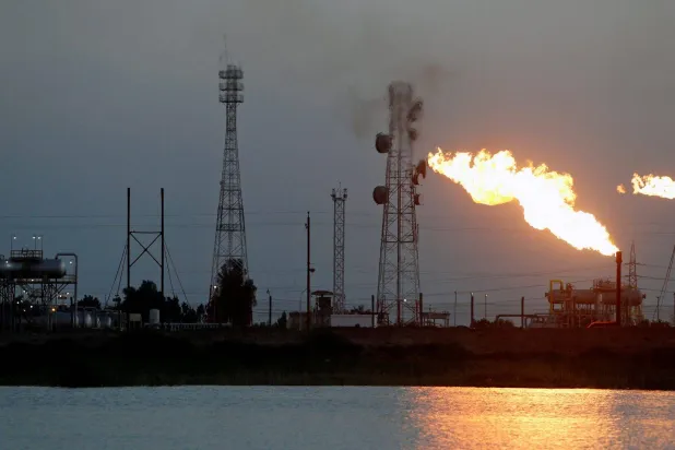 A view across Shatt al-Arab of the 'Bin Omar' oil field north of Basra, Iraq (Reuters)