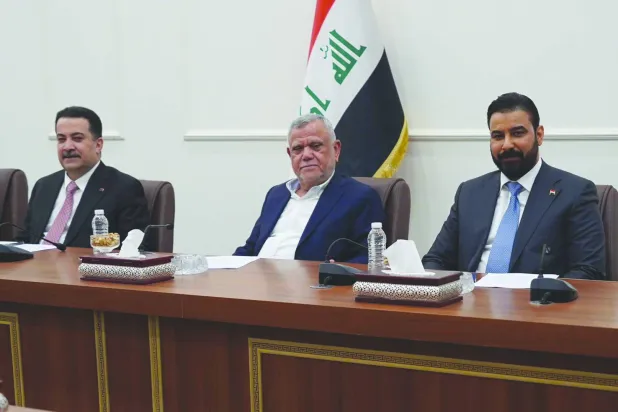 رئيس الحكومة علي الزيدي وعضو «التنسيقي» هادي العامري ورئيس تحالف «التنمية» محمد شياع السوداني (الإطار التنسيقي)