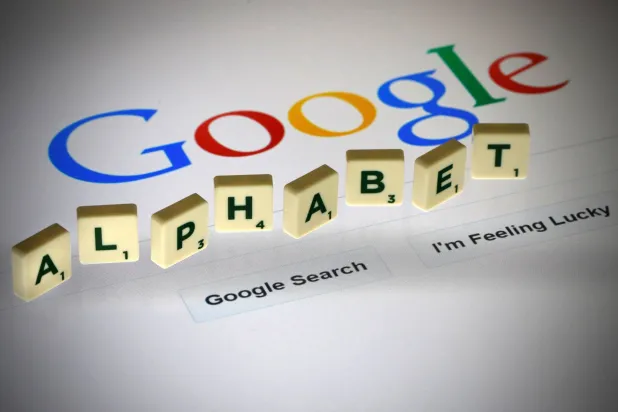The letters of the word "Alphabet" on a computer screen featuring a Google search page in an illustration (Reuters)
