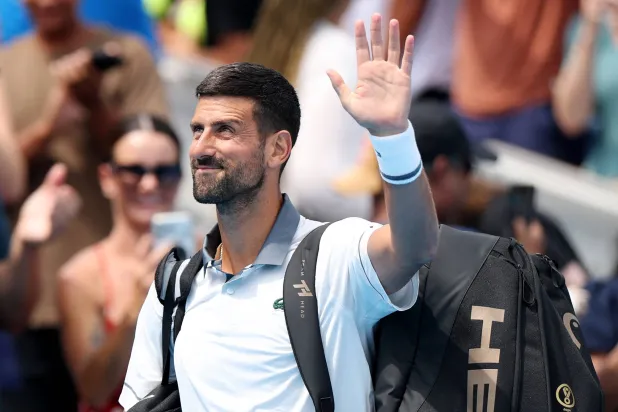 Novak Djokovic of Serbia waves to fans as he walks onto the court for a match against Thiago Agustin Tirante of Argentina on day five of the Cincinnati Open at Lindner Family Tennis Center on August 15, 2026 in Mason, Ohio. (Getty Images/AFP) 