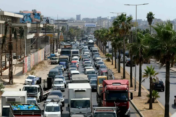 Traffic congestion of cars arriving from the South on the coastal road in the city of Sidon (AFP)