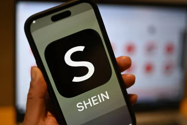FILED - 29 April 2024, Berlin: FILE PHOTO - The Shein logo can be seen on a smartphone. Photo: Monika Skolimowska/dpa