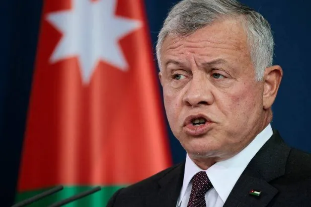 Jordan's King Abdullah II ibn Al-Hussein speaks during a news conference in Berlin, Germany, March 15, 2022. REUTERS/Hannibal Hanschke