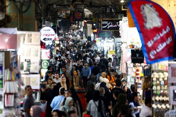 People walk in the Grand Bazaar in Tehran, Iran, August 17, 2026. Majid Asgaripour/WANA (West Asia News Agency) via Reuters