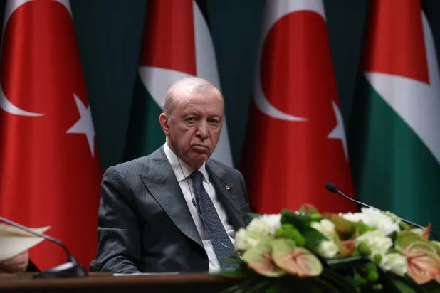 Turkish President Recep Tayyip Erdogan and Palestinian President Mahmoud Abbas (not pictured) attend a press conference following their meeting in Ankara, Türkiye, 12 August 2026. (EPA)