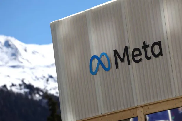 The Meta company logo at the entrance of its temporary pavilion before the World Economic Forum in Davos, Switzerland, January 18, 2025 (Reuters)