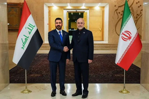 الزيدي وقاليباف خلال لقائهما في طهران الشهر الماضي (أ.ف.ب)