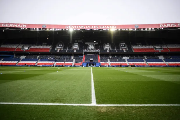 (FILES) A picture shows the empty stands and pitch before the French Cup round of 16 football match between Paris Saint-Germain (PSG) and Lille (LOSC) at the Parc des Princes stadium in Paris, on March 17, 2021. (Photo by FRANCK FIFE / AFP)