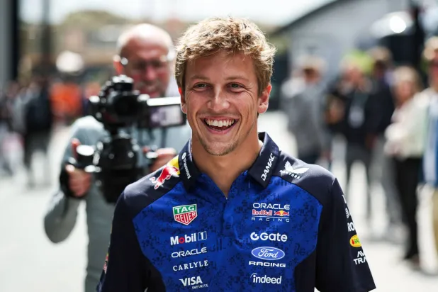 Racing Bulls' New Zealand driver Liam Lawson walks in the paddock ahead of the Formula One Dutch Grand Prix at The Circuit Zandvoort, western Netherlands, on August 20, 2026. (AFP)