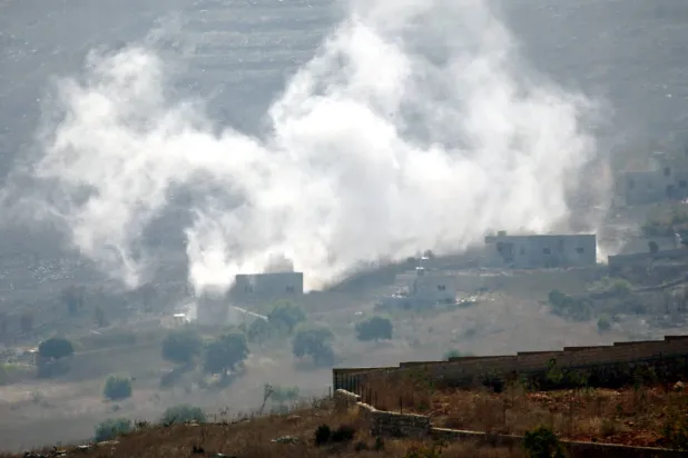 Smoke rises after Israeli tanks shelled targets in  the municipality of Mais al-Jabal, as seen from Chaqra village, in southern Lebanon, 21 August 2026. EPA/STRINGER