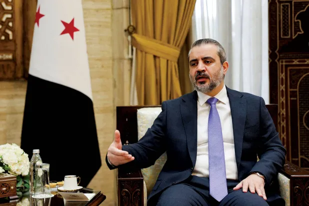 وزير الخارجية السوري أسعد الشيباني خلال مقابلة مع وكالة «رويترز» (رويترز)