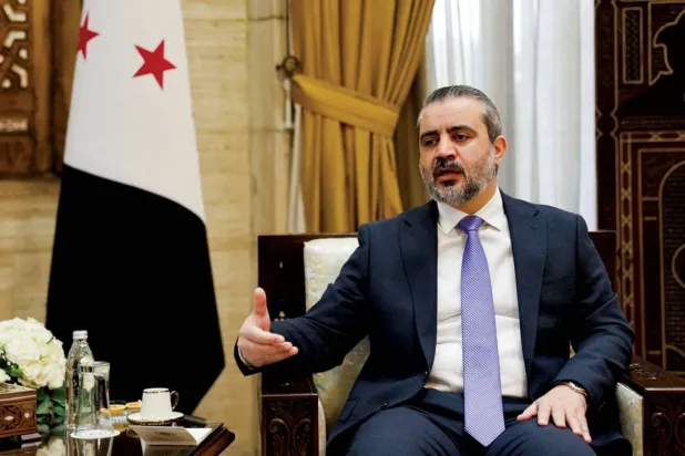 Suriye Dışişleri Bakanı Esad el-Şeybani, Reuters ajansına röportaj verirken, (Reuters)
