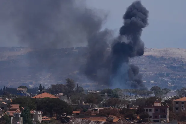  Smoke rises as Israeli forces demolish homes in Zawtar al-Sharqiyeh, southern Lebanon, Sunday, Aug. 23, 2026. (AP) 