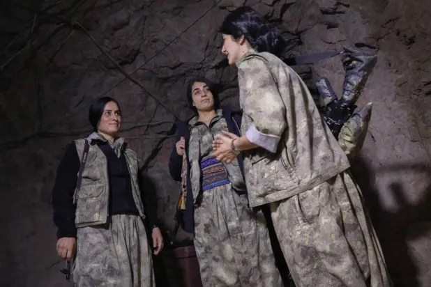 A law passed by the Turkish parliament on August 10 allows for the conditional return of PKK members after their weapons have been verified. (AFP)