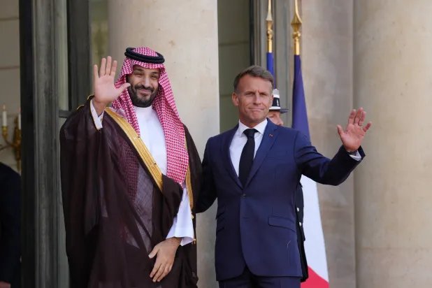 France's President Emmanuel Macron, right, greets Saudi Crown Prince Mohammed bin Salman before a meeting at the Elysee Palace in Paris, France, Monday Aug. 24, 2026. (AP Photo/Aurelien Morissard)
