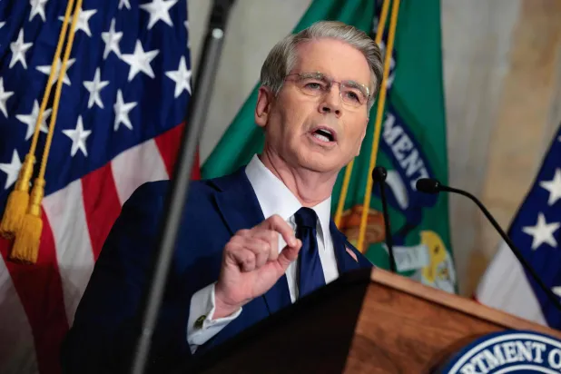 WASHINGTON, DC - AUGUST 24: US Treasury Secretary Scott Bessent announces a new set of sanctions against Iran in the Cash Room at the Treasury Department on August 24, 2026 in Washington, DC. Chip Somodevilla/Getty Images/AFP