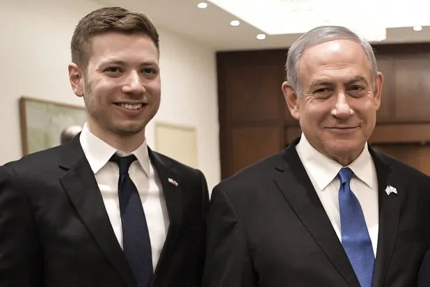 Benjamin Netanyahu alongside his son Yair (AP file photo)