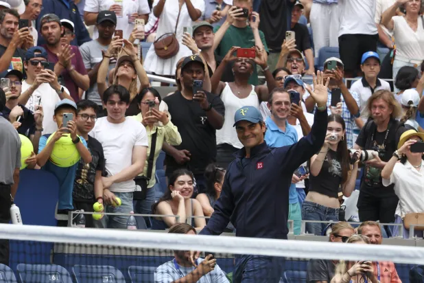 Swiss former tennis player Roger Federer (front) arrives to practice on the main court at Arthur Ashe Stadium at the USTA Billie Jean King National Tennis Center in Flushing Meadows, New York, US, 24 August 2026. (EPA)