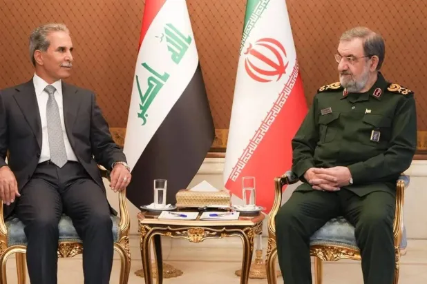 Iran’s Supreme National Security Council Secretary Mohsen Rezaei receives Iraq’s top judge Faiq Zidan in Tehran on Tuesday (Mehr)