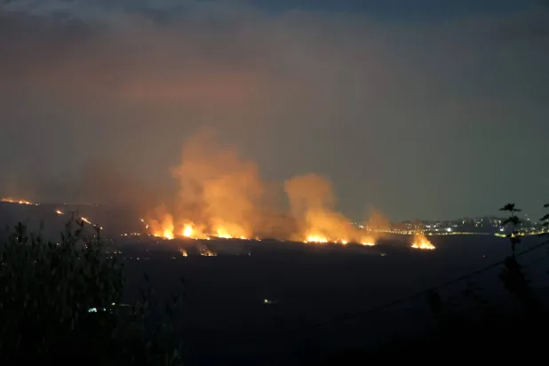 Smoke rises from fires ignited by Israeli shelling that targeted the plain of Marjeyoun in southern Lebanon on August 25, 2026. (AFP)