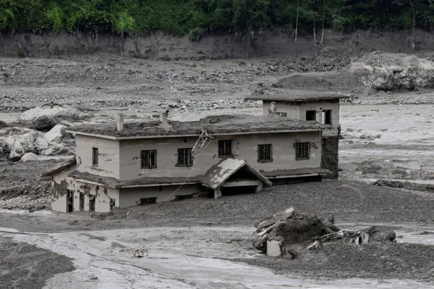 A mud-covered building following a flash flood at Trishuli in Nuwakot district, Nepal, August 26, 2026. (Reuters)