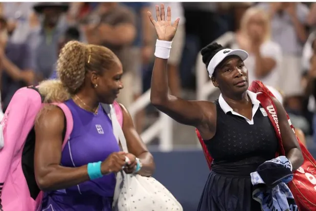  Serena Williams, left, and Venus Williams, right, both of the United States, wave to the crowd at the end of a women's doubles match against Marta Kostyuk, of Ukraine, and Peyton Stearns, also of the United States, at the Cincinnati Open tennis tournament, Monday, Aug. 17, 2026, in Mason, Ohio. (AP)