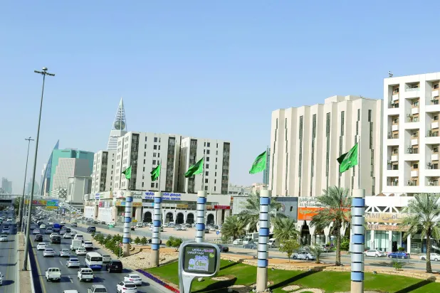 Cars drive along a street in Riyadh. (Reuters)