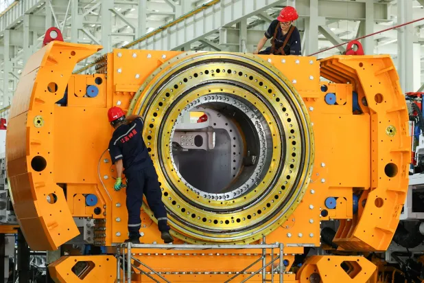 Chinese Factory Slump Eases, but Weak Services Signal Uneven Recovery