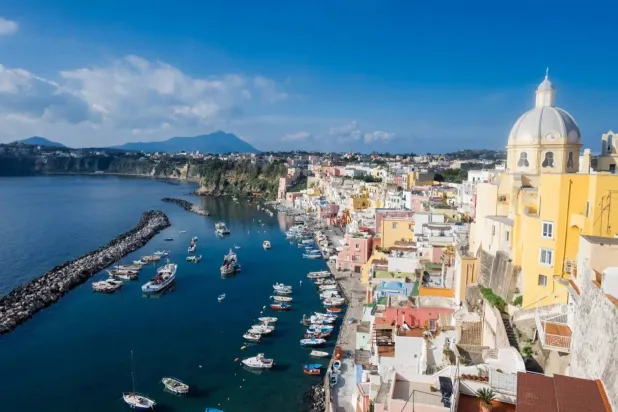 A view of the colorful houses and boats in the harbor of Marina Corricella on Procida Island, Italy. (Shutterstock) 