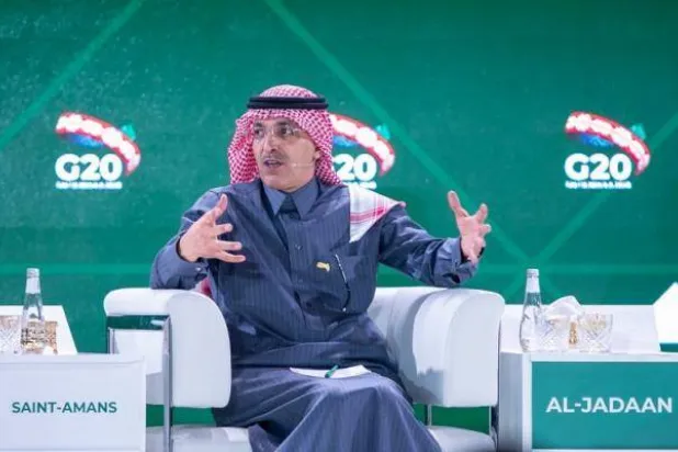 وزير المالية السعودي محمد الجدعان متحدثاً لندوة سابقة لـ«مجموعة العشرين» بالرياض (واس)