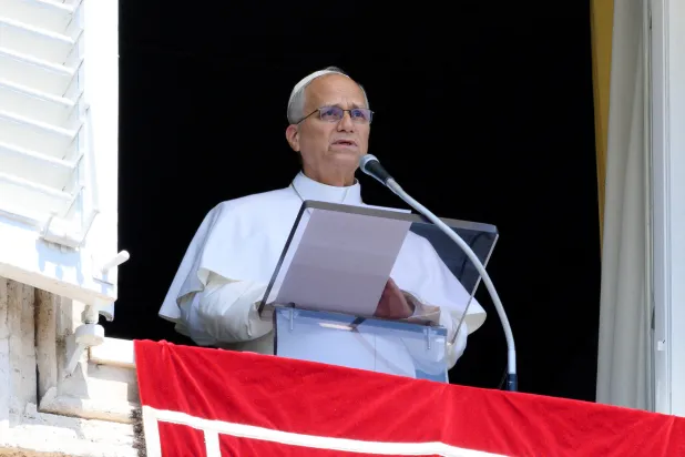 Pope Leo XIV leads the weekly Angelus prayer from a window at the Vatican, August 9, 2026. Vatican Media/Mario Tomassetti/­Handout via REUTERS