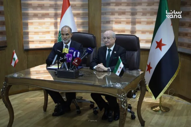 Syrian Transport Minister Yarub Badr and Lebanese Public Works and Transport Minister Fayez Rasamny speak at a press conference at the Syrian Transport Ministry. (SANA)