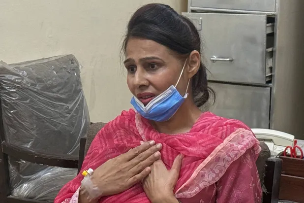  Nurse Razia Noreen, who risked her life to save a newborn during a fire at the Pakistan Institute of Medical Sciences, speaks during an interview in Islamabad, Tuesday, Sept. 1, 2026. (AP) 