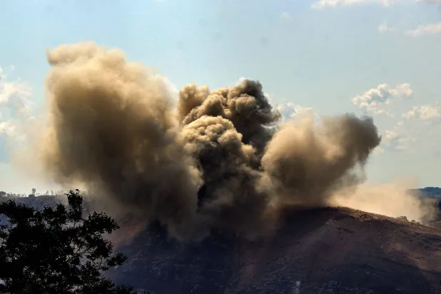  31 August 2026, Lebanon, Arnoun: Smoke billows after an Israeli detonation on Arnoun, not far from the strategic Ali al-Taher Ridge. (dpa)