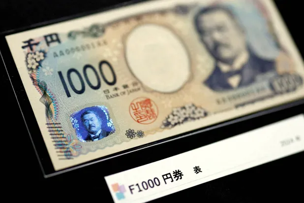 ورقة نقدية من فئة 1000 ين ياباني (رويترز)