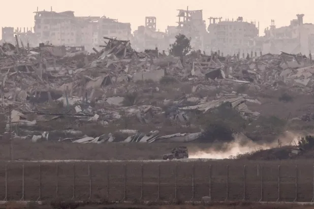 An Israeli military vehicle maneuvers in Gaza, as seen from the Israeli side of the border, September 1, 2026. (Reuters)