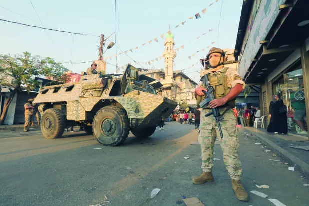 Lebanese soldiers stand guard at the entrance of Burj Barajneh Palestinian refugee camp in southern Beirut, Lebanon, 21 August 2025.   EPA/WAEL HAMZEH