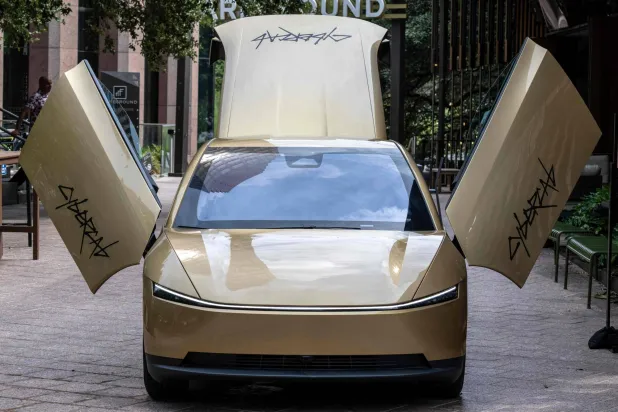 A Tesla's "Cybercab" is displayed in downtown Austin, Texas, on September 3, 2026. (AFP) 