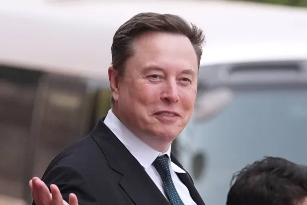 Elon Musk departs after a welcome ceremony with President Donald Trump and China's President Xi Jinping at the Great Hall of the People, May 14, 2026, in Beijing. (AP)