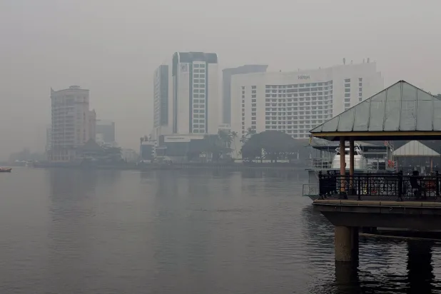 Kuching riverside in the city center is shrouded in thick haze in Kuching, Sarawak state, Malaysia, Friday, Sept. 4, 2026. (AP)