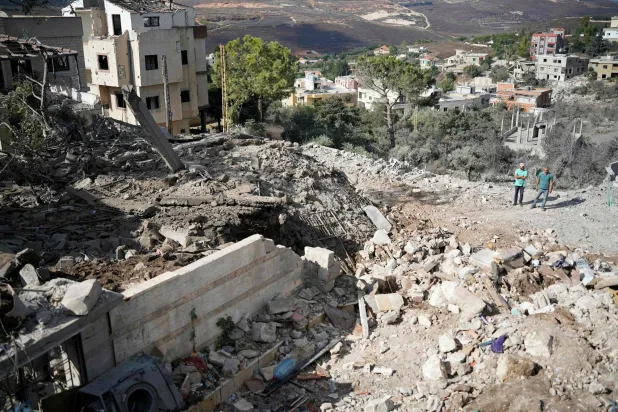 TOPSHOT - Residents inspect the destruction the morning after a night airstrike by the Israeli military that targeted the southern Lebanese village of Mayfadoun on September 5, 2026. (Photo by ammar ammar / AFP) 