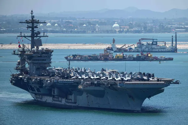 US nuclear-powered aircraft carrier USS Abraham Lincoln (CVN-72) departs Laem Chabang Port, near the city of Pattaya on September 6, 2026. (Photo by Chanakarn LAOSARAKHAM / AFP)
