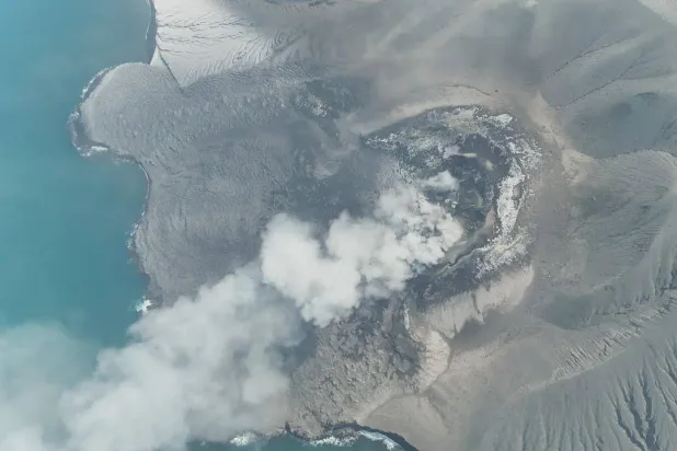 In this drone photo released by the Geological Agency (Badan Geologi) of Indonesia's Ministry of Energy and Mineral Resources, Mount Anak Krakatau spews volcanic smoke in Sunda Strait, Indonesia, Saturday, Sept. 5, 2026. (Badan Geologi via AP)