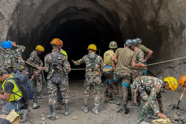 A handout photograph taken by the Nepal Army shows personnel conducting a search and rescue operation at the Rasuwagadhi Hydropower project in Rasuwa. Handout / NEPAL ARMY/AFP/File
